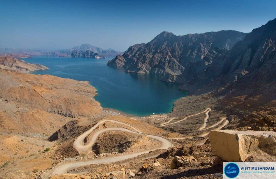 How can you travel to the Musandam Peninsula?