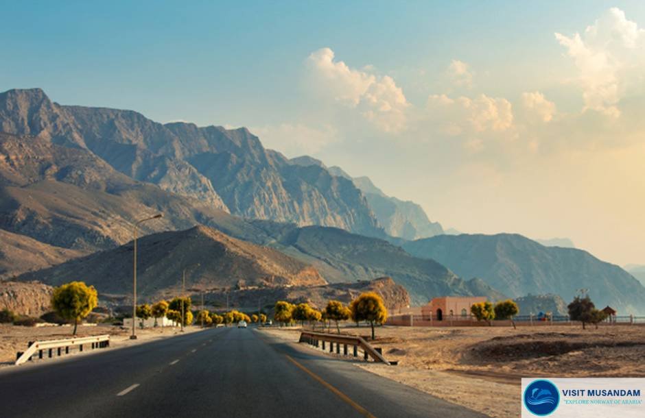 How long does it take to drive from Abu Dhabi to Musandam?