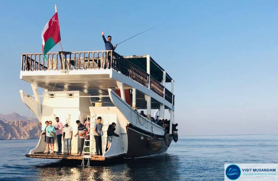 Why is dhow cruising perfect for families?